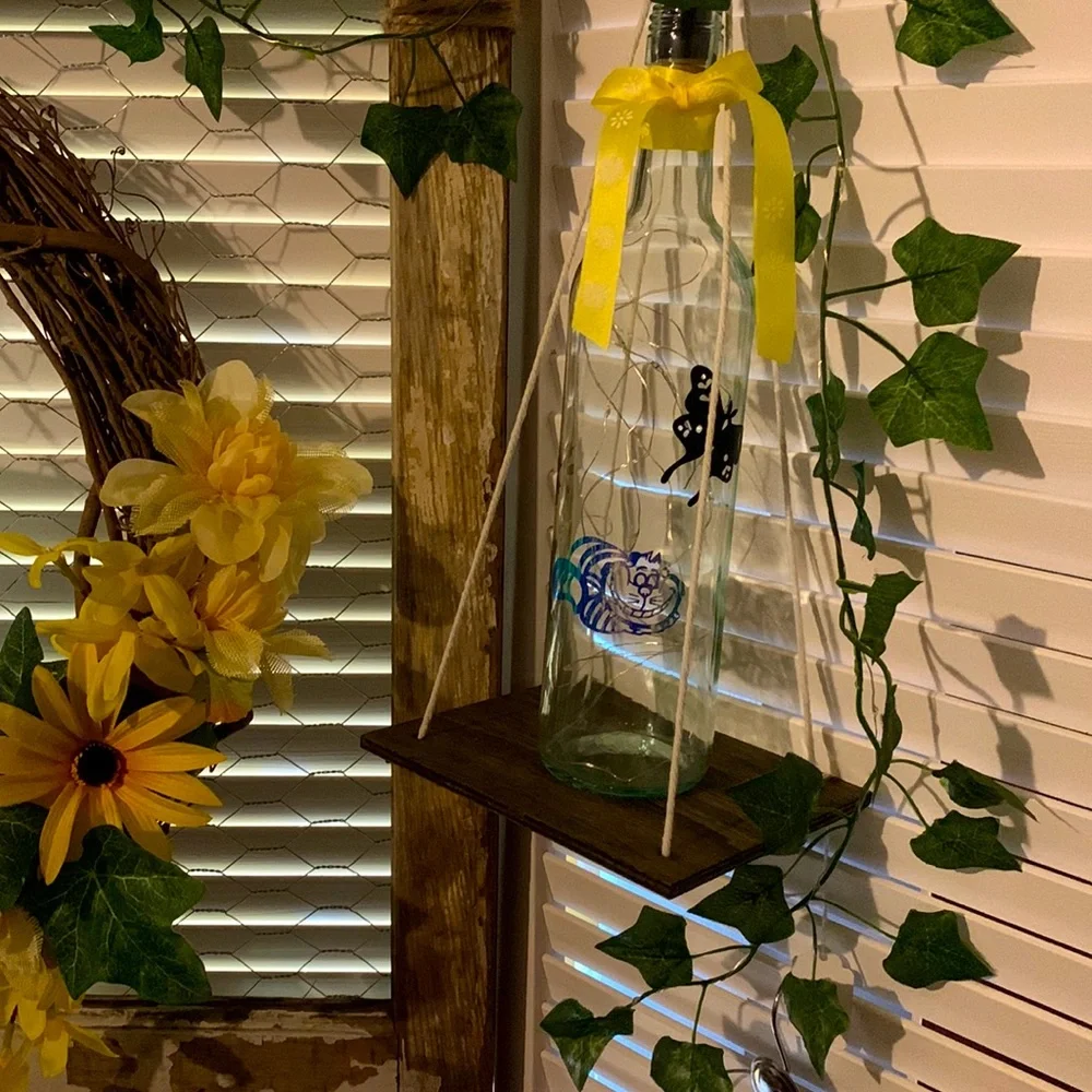 Iridescent Cheshire Cat wine bottle lantern
